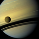 Titan in orbit around Saturn.